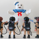 Each Ghostbuster comes with a wearable proton pack and wand they can hold.